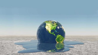 Earth melting into water climate change Environment shutterstock 153806906
